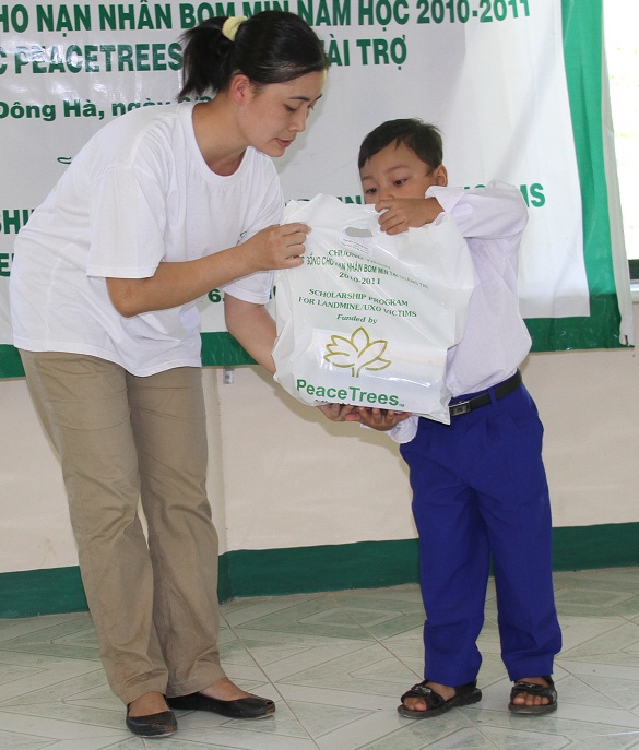 Duy receives his books and supplies for the school year