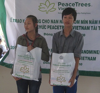 Tuat and his sister, Yen, receive their educational scholarship packages