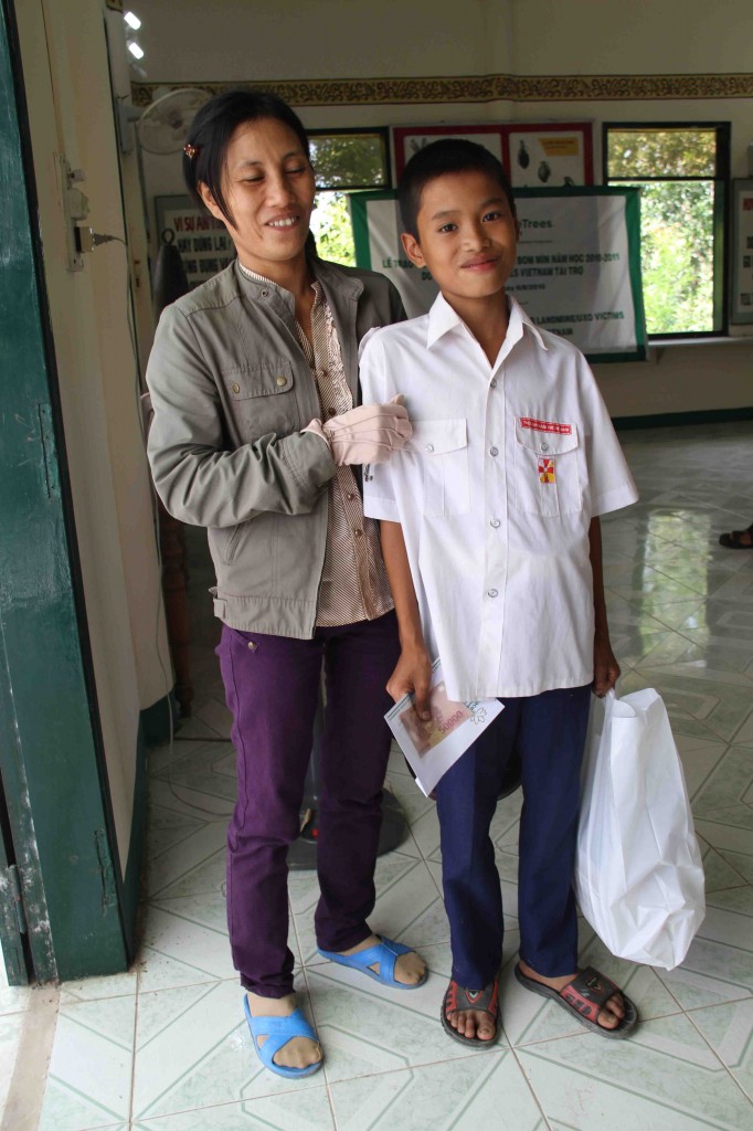 Nhat receives her school supplies for 7th grade